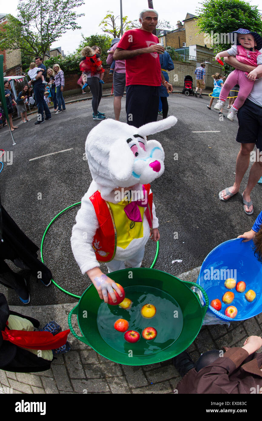 Children enjoy the fun and games at a London fancy dress street party