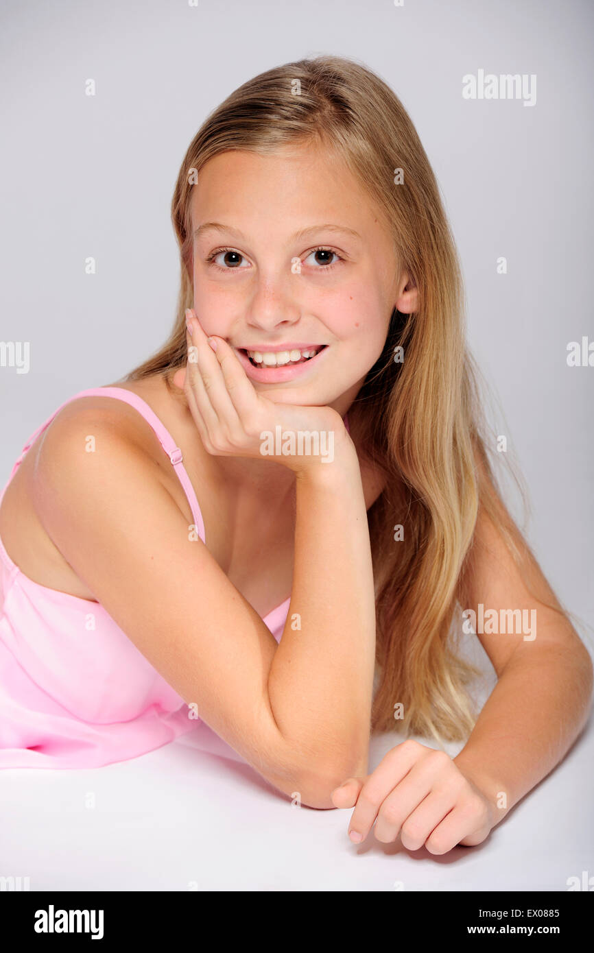 young, girl, studio, portrait, one person, beautiful, body, cheerful, child, childhood, cute, emotion, expression, face, smiling Stock Photo
