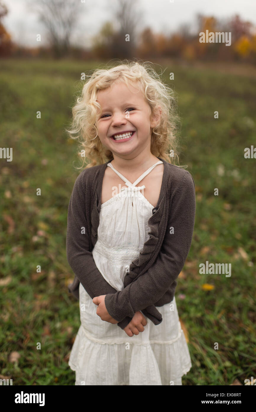 Portrait Of Young Girl Smiling Outdoors Stock Photo Alamy portrait-of-young-girl-smiling-outdoors-stock-photo-alamy