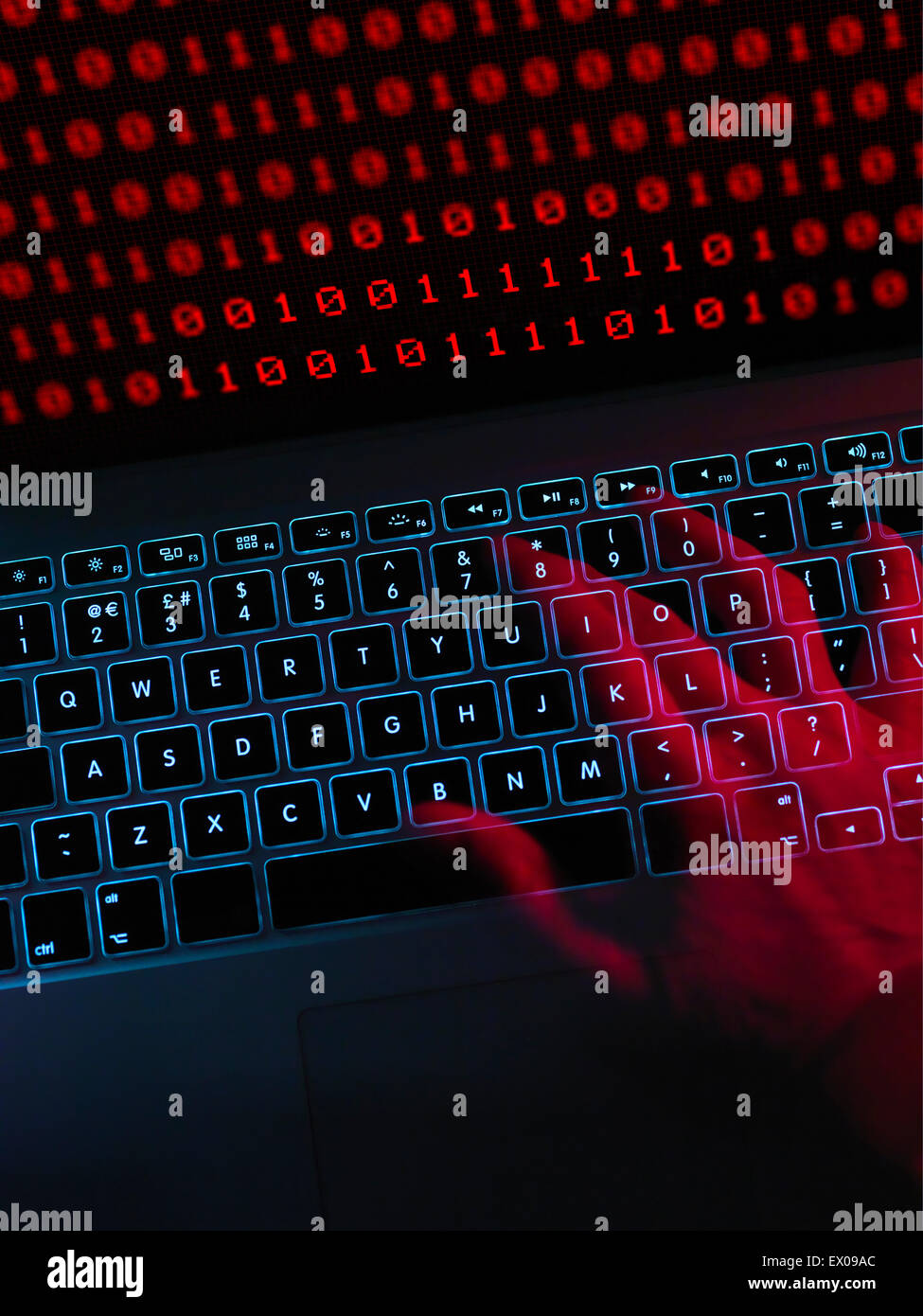 Computer hacker at work Stock Photo