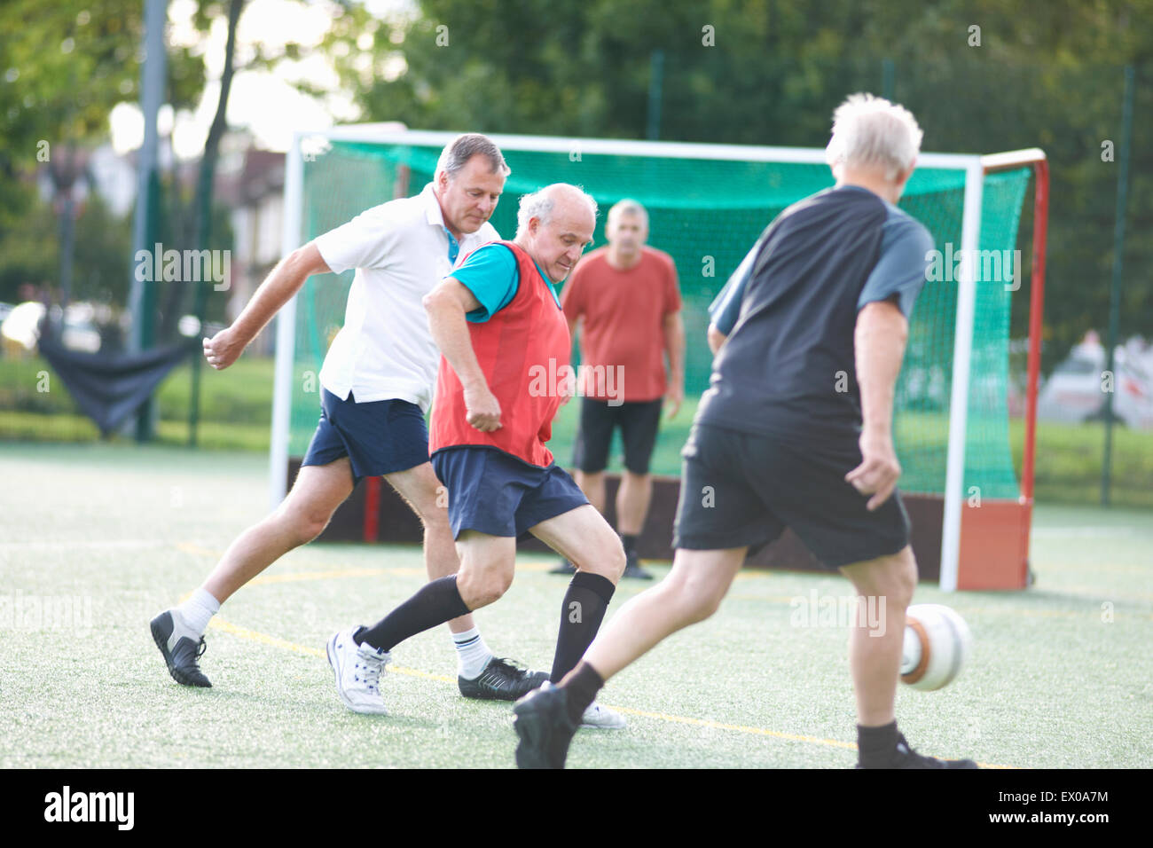 Men playing football Stock Photo