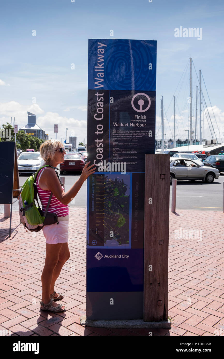 Sign marking the finish of the 16km coast to coast walk at Viaduct harbour in Auckland, New Zealand. Stock Photo