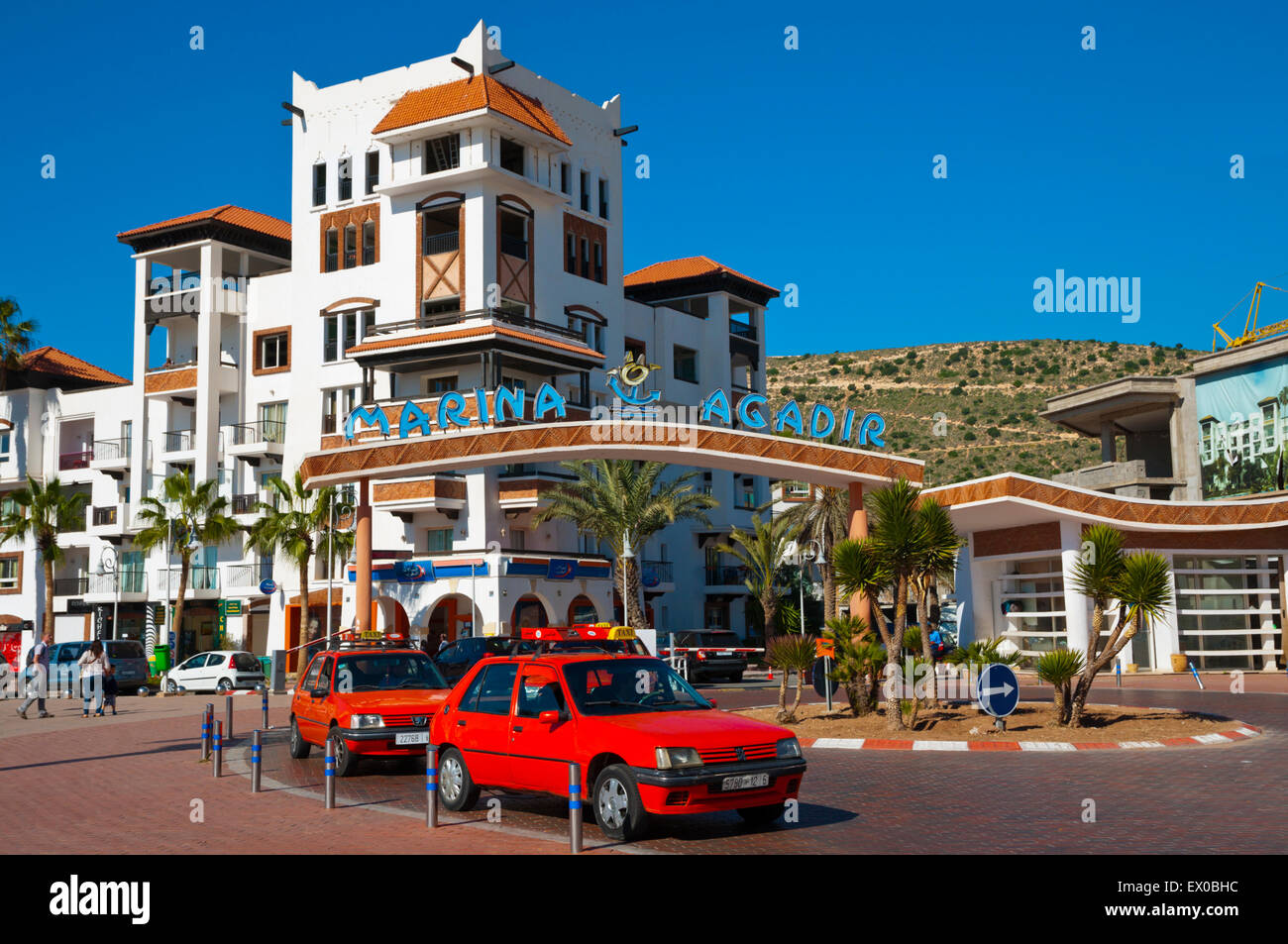Petit taxis in front of Marina, the port area, Agadir, the Souss Valley, southern Morocco, northern Africa Stock Photo