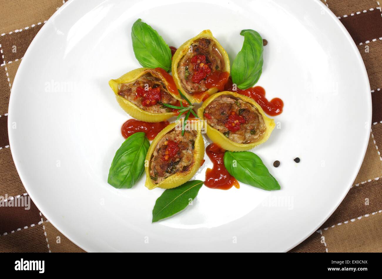 stuffed pasta shells with rosemary and basil Stock Photo