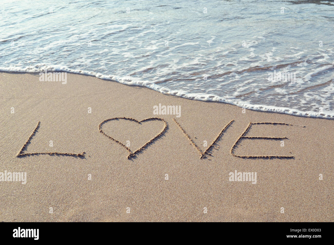 Red Heart On Sandy Beach Word Stock Photo 1161487648