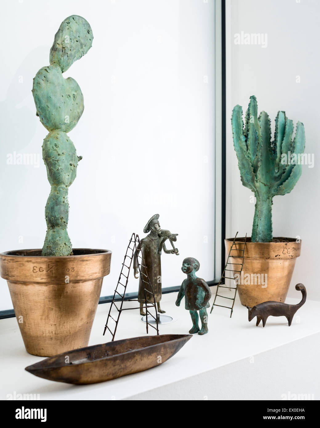 Pair of bronze cacti by sculptor Edward Cronshaw Stock Photo
