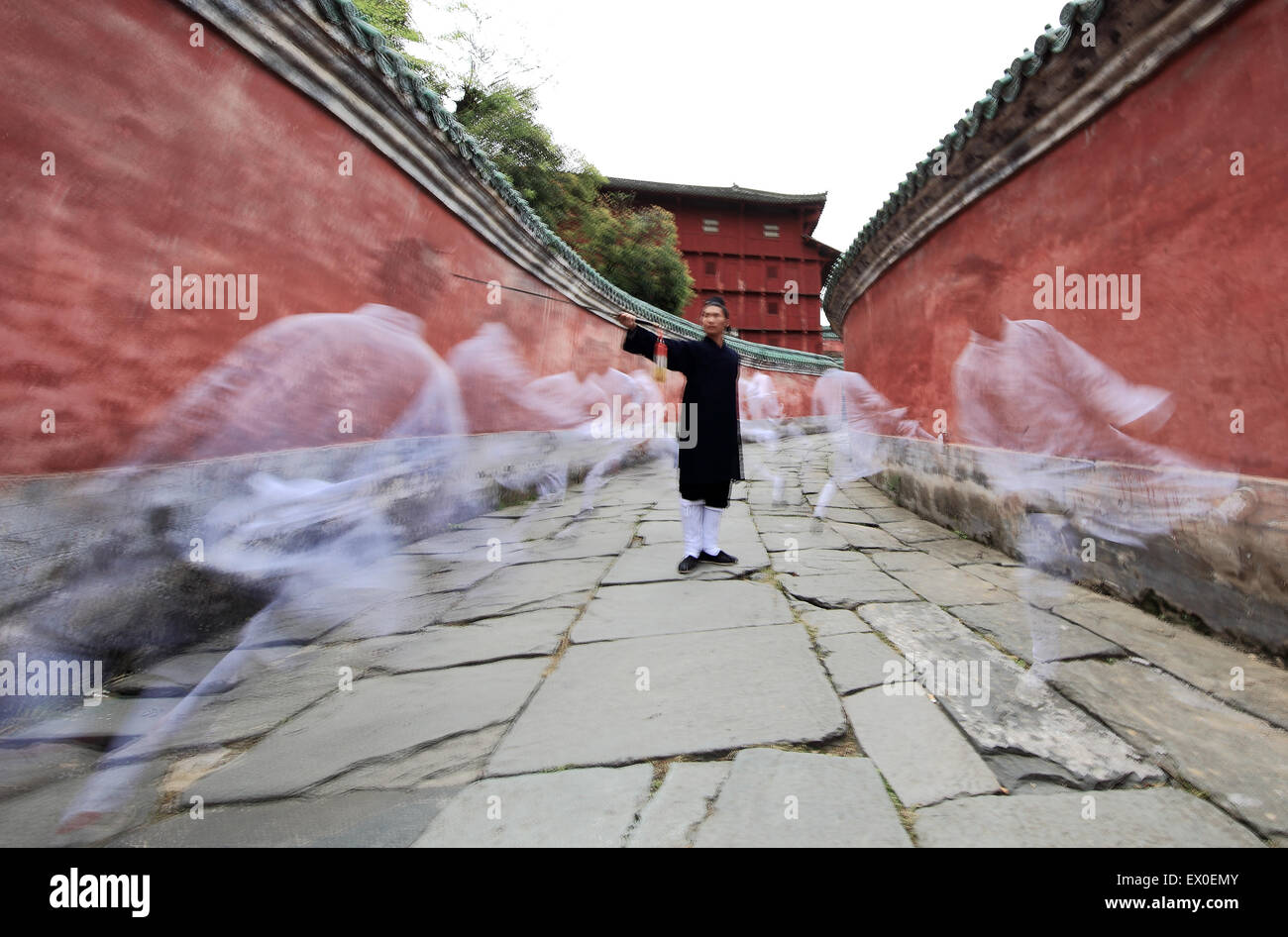 Taoist monk practicing Wudang martial arts at Wudang Mountains, China