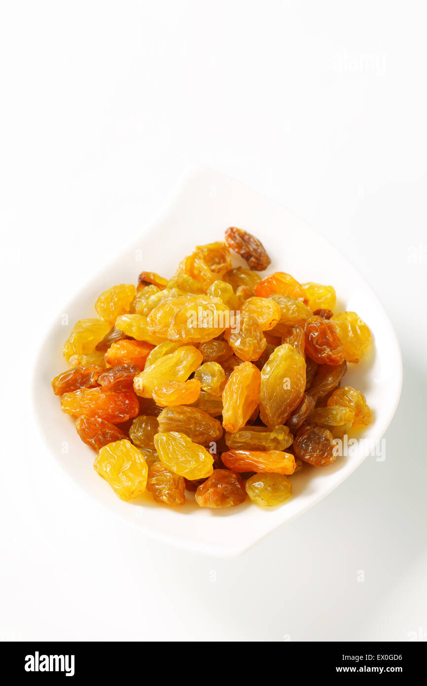 Sultana raisins in a small bowl Stock Photo Alamy