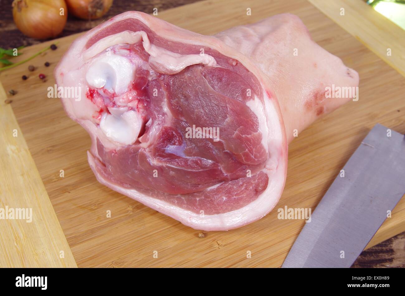 raw knuckle of pork on wooden board, Stock Photo