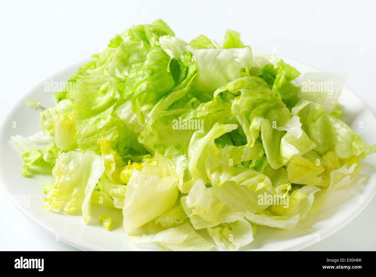 Iceberg lettuce salad on plate Stock Photo Alamy