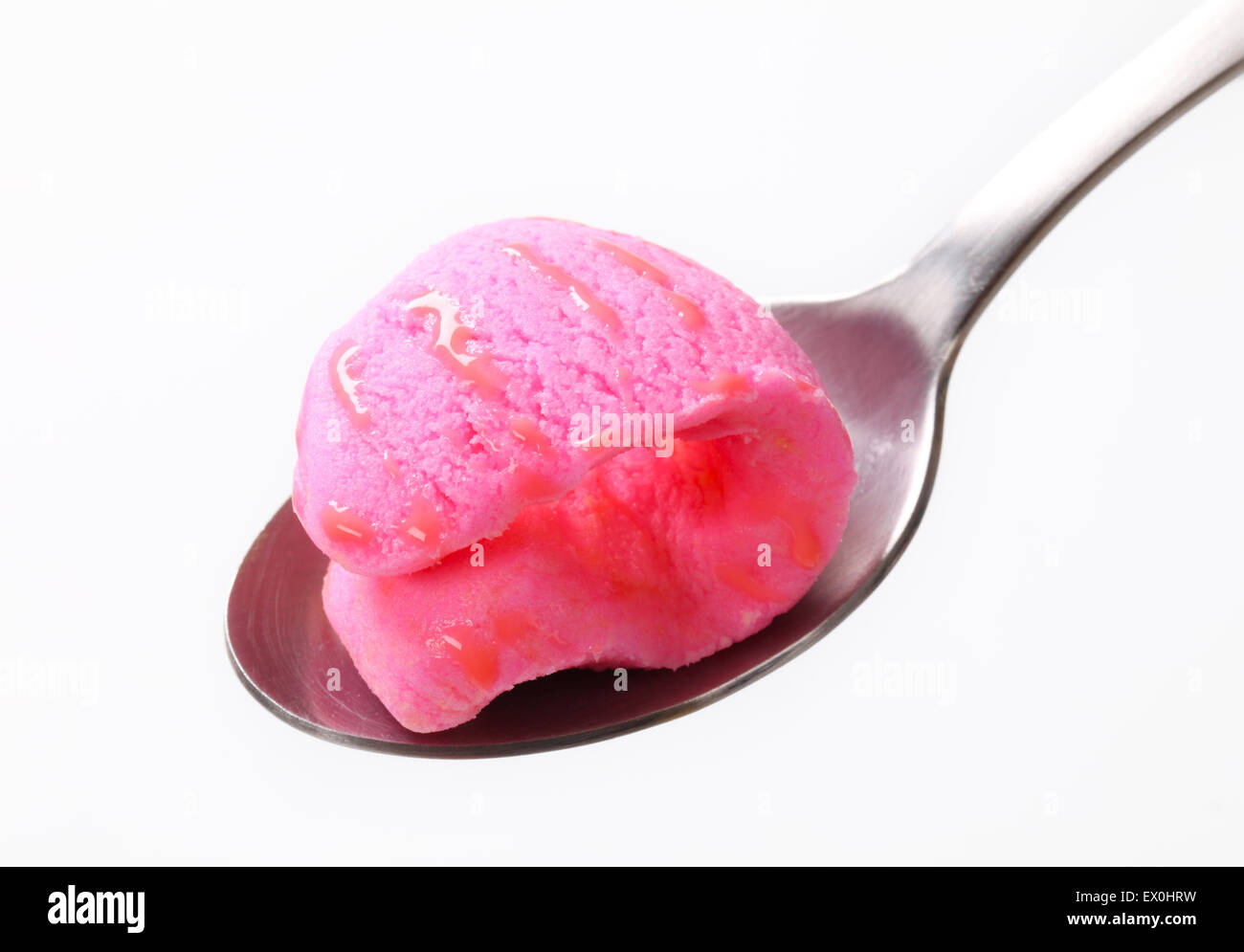 Pink ice cream on metal spoon Stock Photo