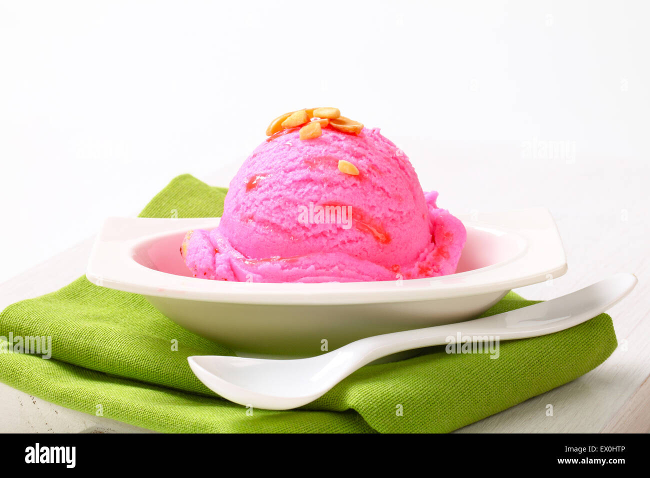 Scoop of pink ice cream in a dessert bowl Stock Photo