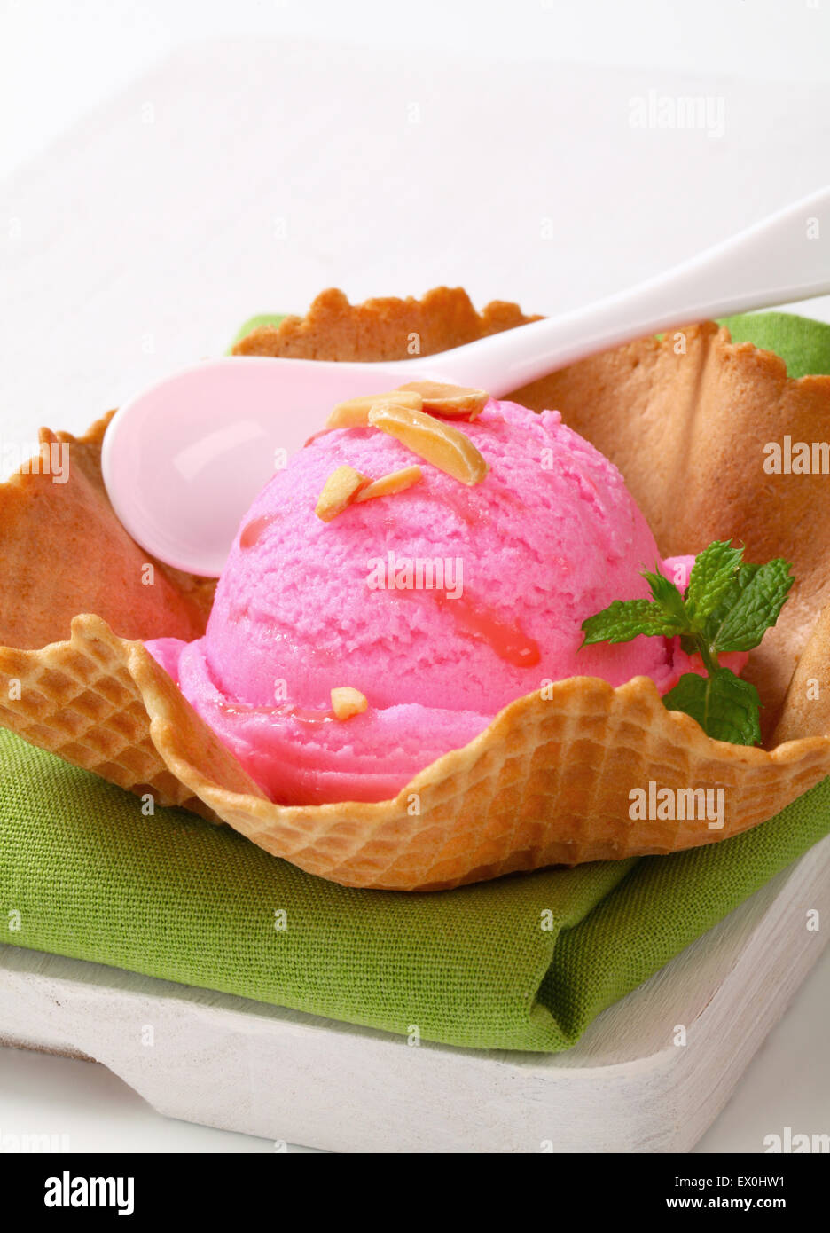 Pink fruit flavored ice cream in a waffle basket Stock Photo
