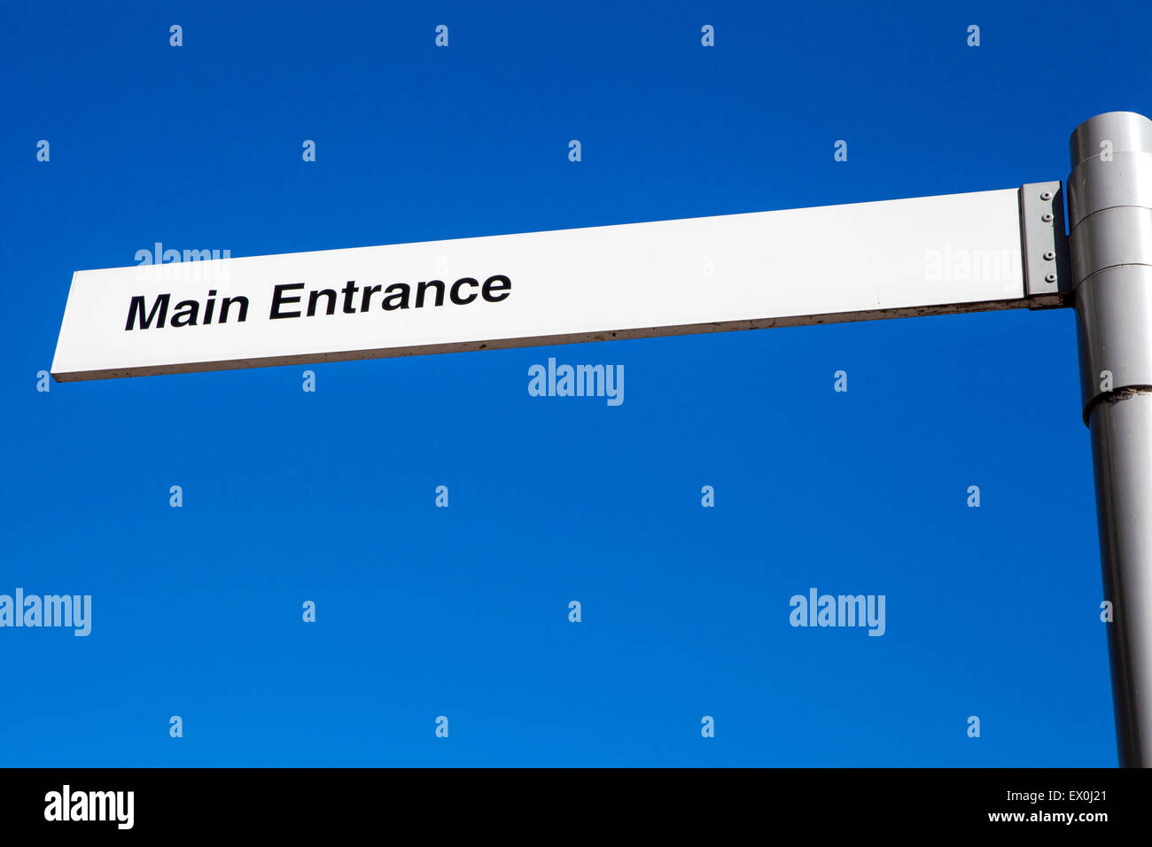 A sign indicating the direction of the Main Entrance Stock Photo Alamy