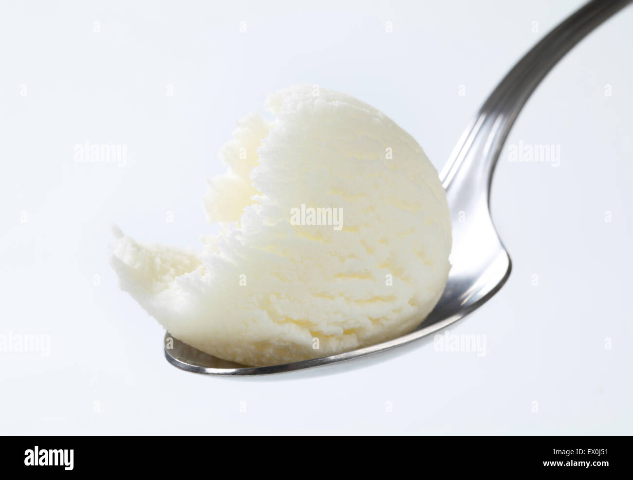 Frozen yogurt on metal spoon Stock Photo