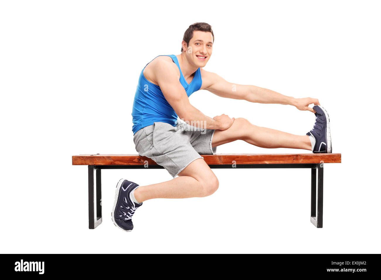 Male athlete stretch leg Cut Out Stock Images & Pictures - Alamy