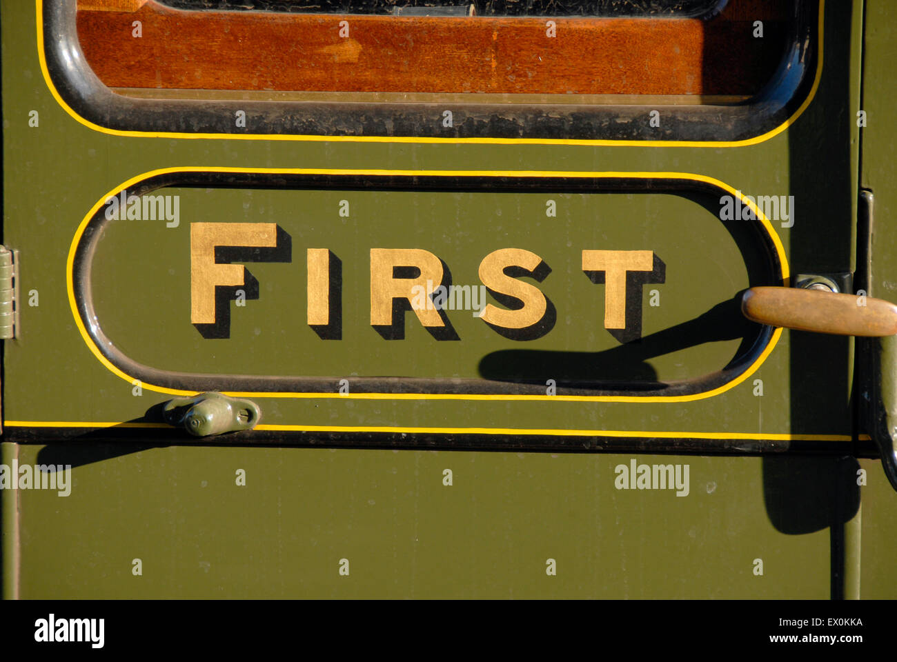 Sign 'First' on railway carriage door Stock Photo