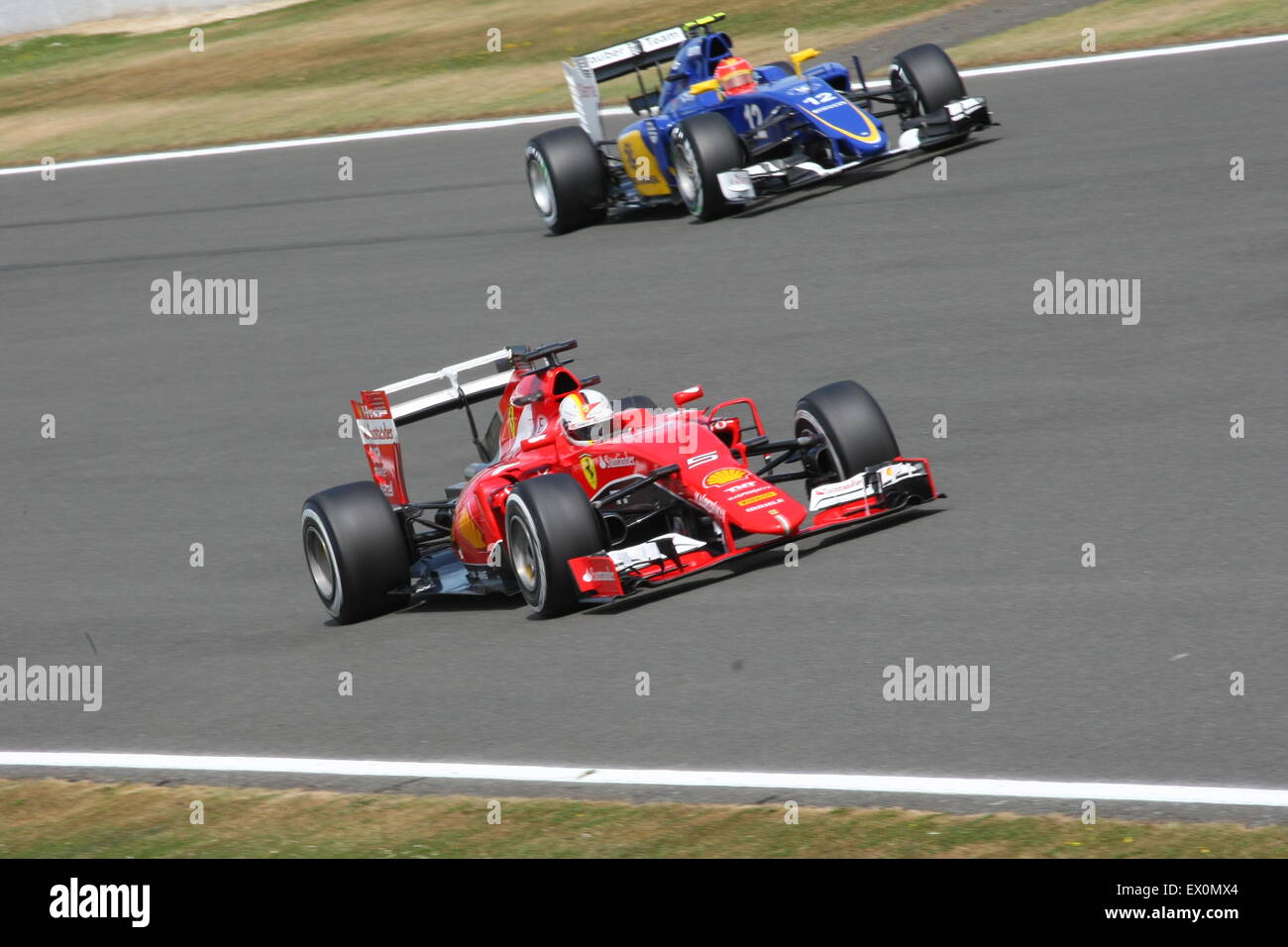 Sebastian Vettel in his Ferrari Formula One at speed Stock Photo