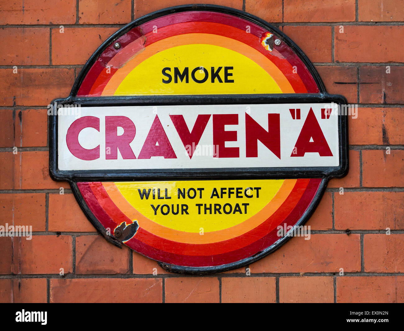 Vintage advertising signs on the station platform at Loughborough, on The Great Central Railway, Leicestershire,Britain. Stock Photo