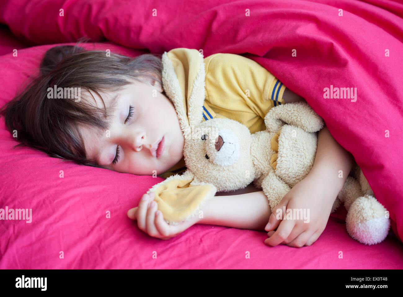 sweet-little-boy-sleeping-in-the-afternoon-with-his-teddy-bear-toy