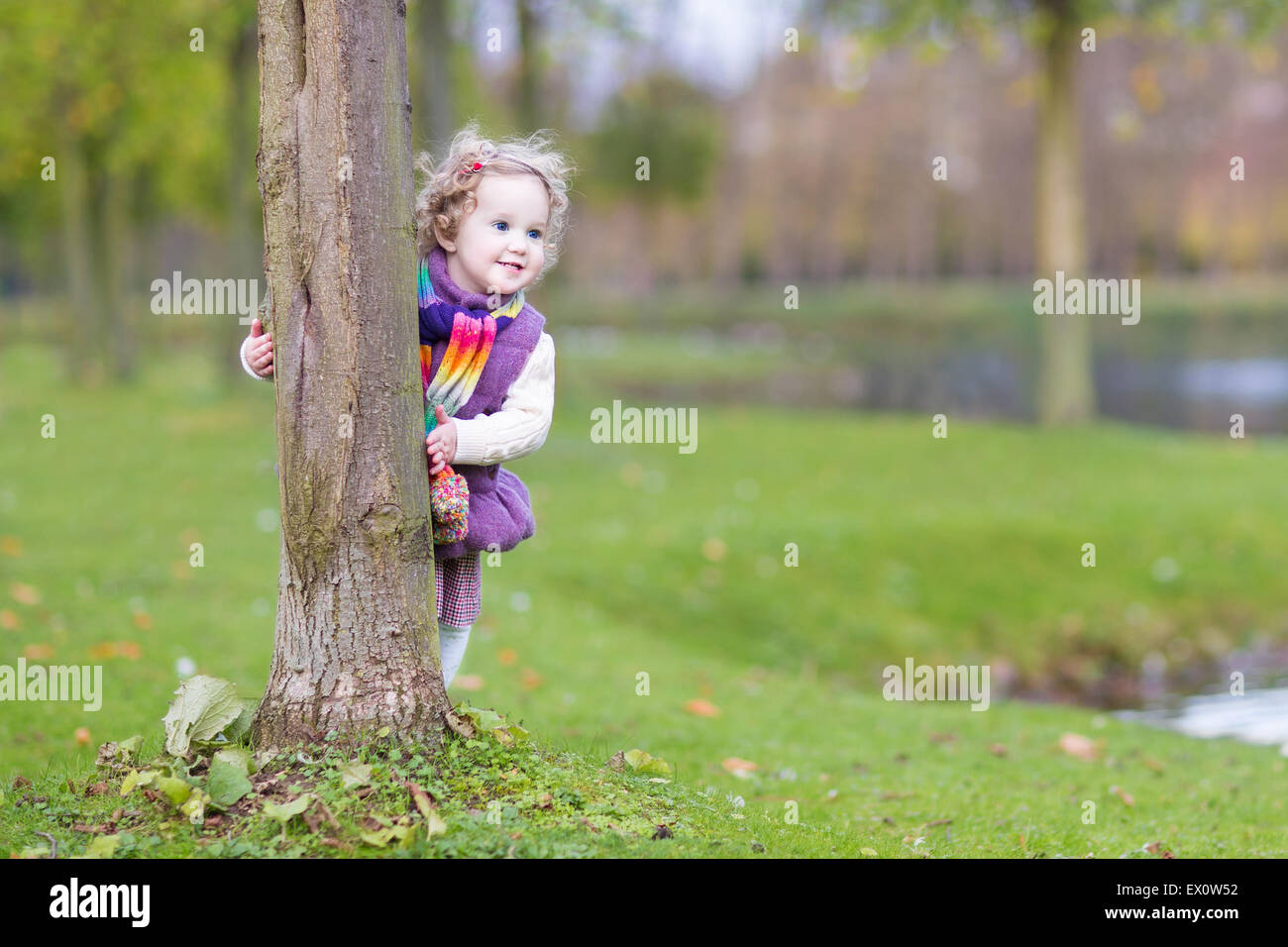 Sweet funny toddler girl hiding hi-res stock photography and images - Alamy Sweet funny toddler girl hiding hi-res stock photography and images - Alamy