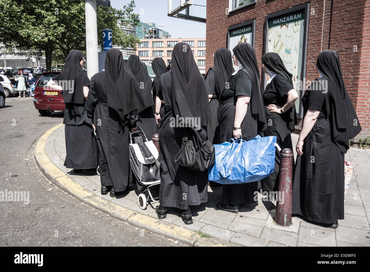 The Hague, The Netherlands. 03rd July, 2015. After the death of Aruban born Mitch Henriquez there have been fierce riots in the multicultural Schilderswijk borough. Many young men take to the streets after iftar and start fires and use violence against riot police. Tensions have remained high after mister Henriquez's death last sunday which is said to have been caused by excessive use of force by police during his arrest. Credit:  Willem Arriens/Alamy Live News Stock Photo