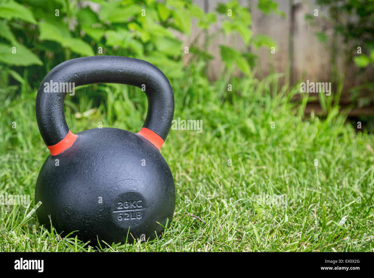 Heavy Iron Competition Kettlebell 62lb 28 Kg On Green Grass In