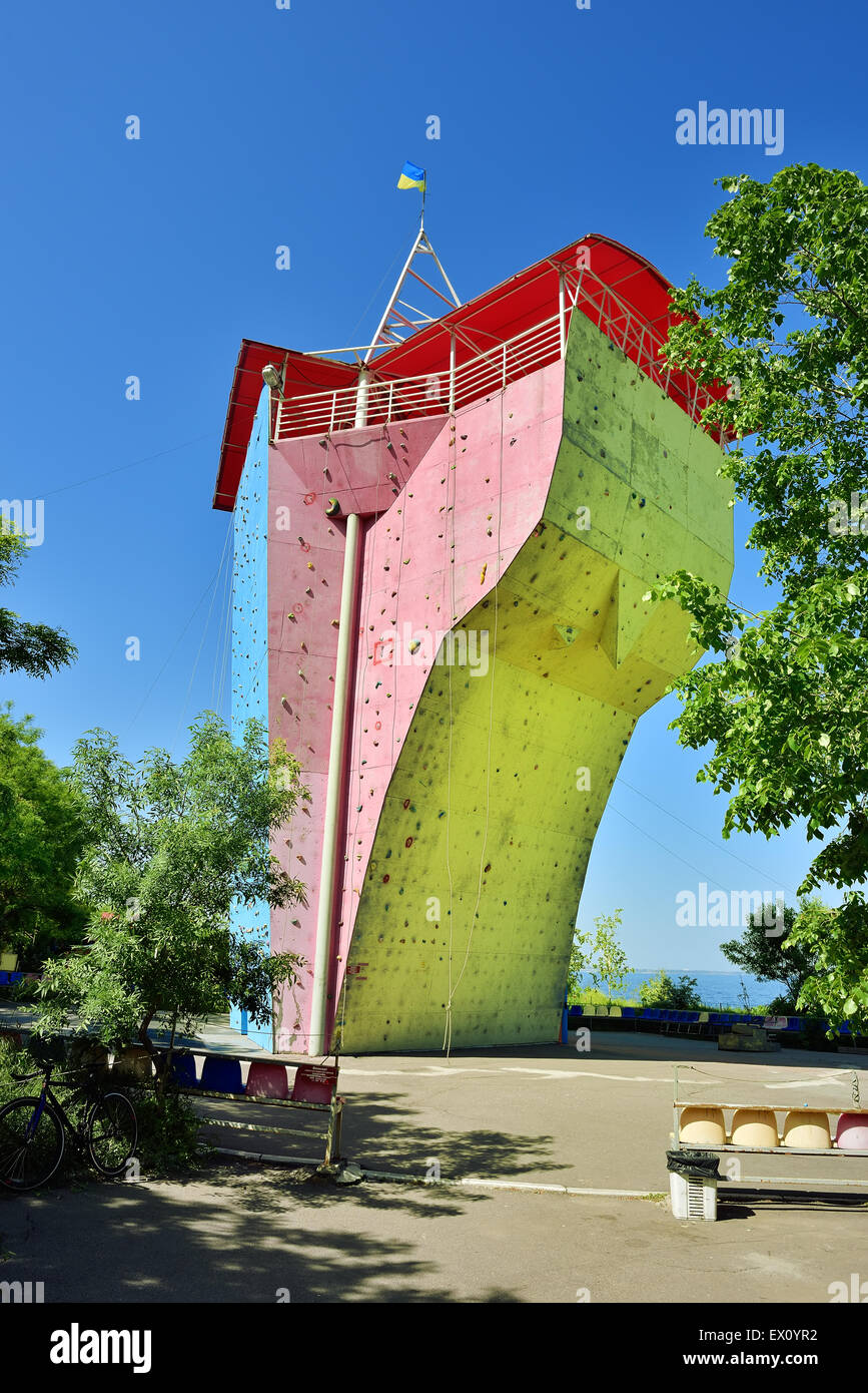 rock climbing wall on a blue background Stock Photo Alamy