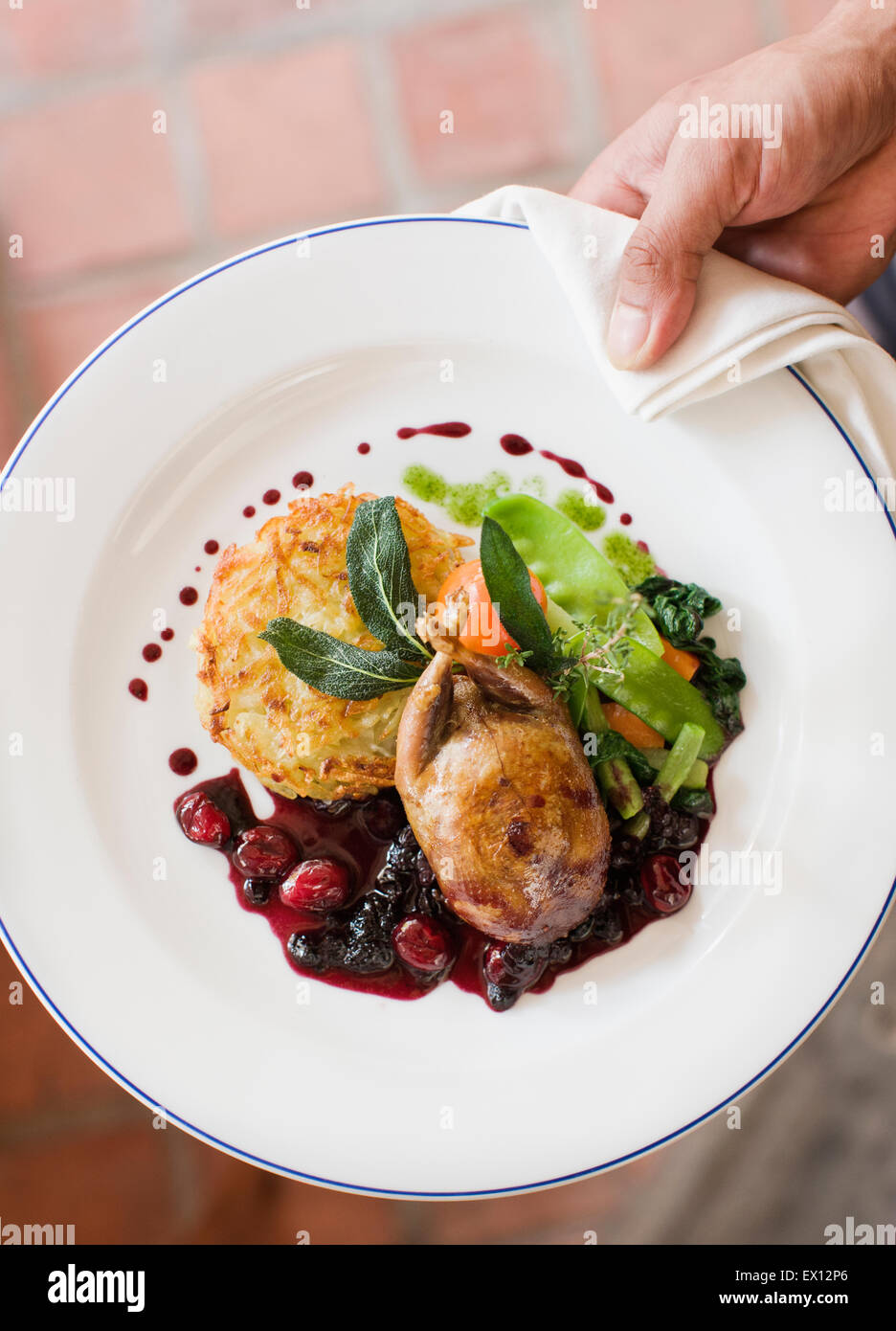 Roasted boneless quail stuffed with Luang Prabang mushrooms with Red