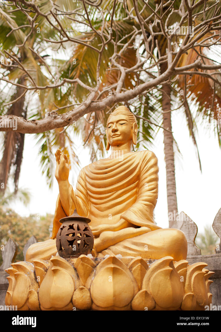 A garden of Buddhas inside Wat Choumkhong. The Buddhas show some of the 7 positions of Buddha.Luang Prabang,Laos Stock Photo