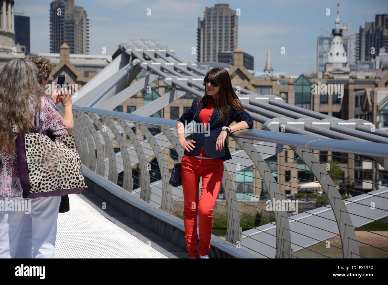 Posing on the Millennium Bridge, London. England. Stock Photo