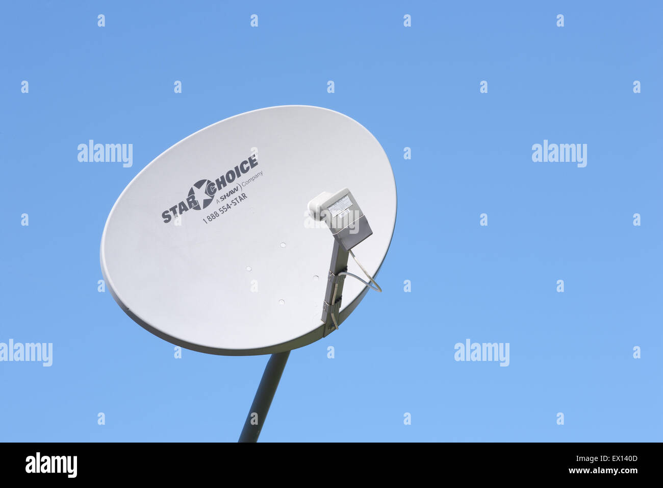 PLEASANT VALLEY, CANADA - JUNE 24, 2015: Shaw Direct satellite dish. Shaw Direct is a Canadian satellite television broadcaster. Stock Photo