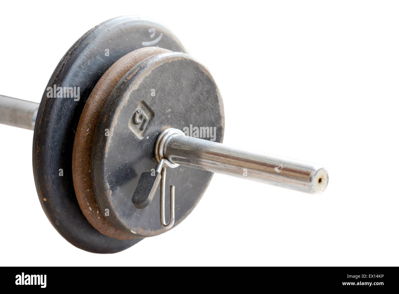 Close up of  old rusty dumbbells bar weights isolated on a white background Stock Photo