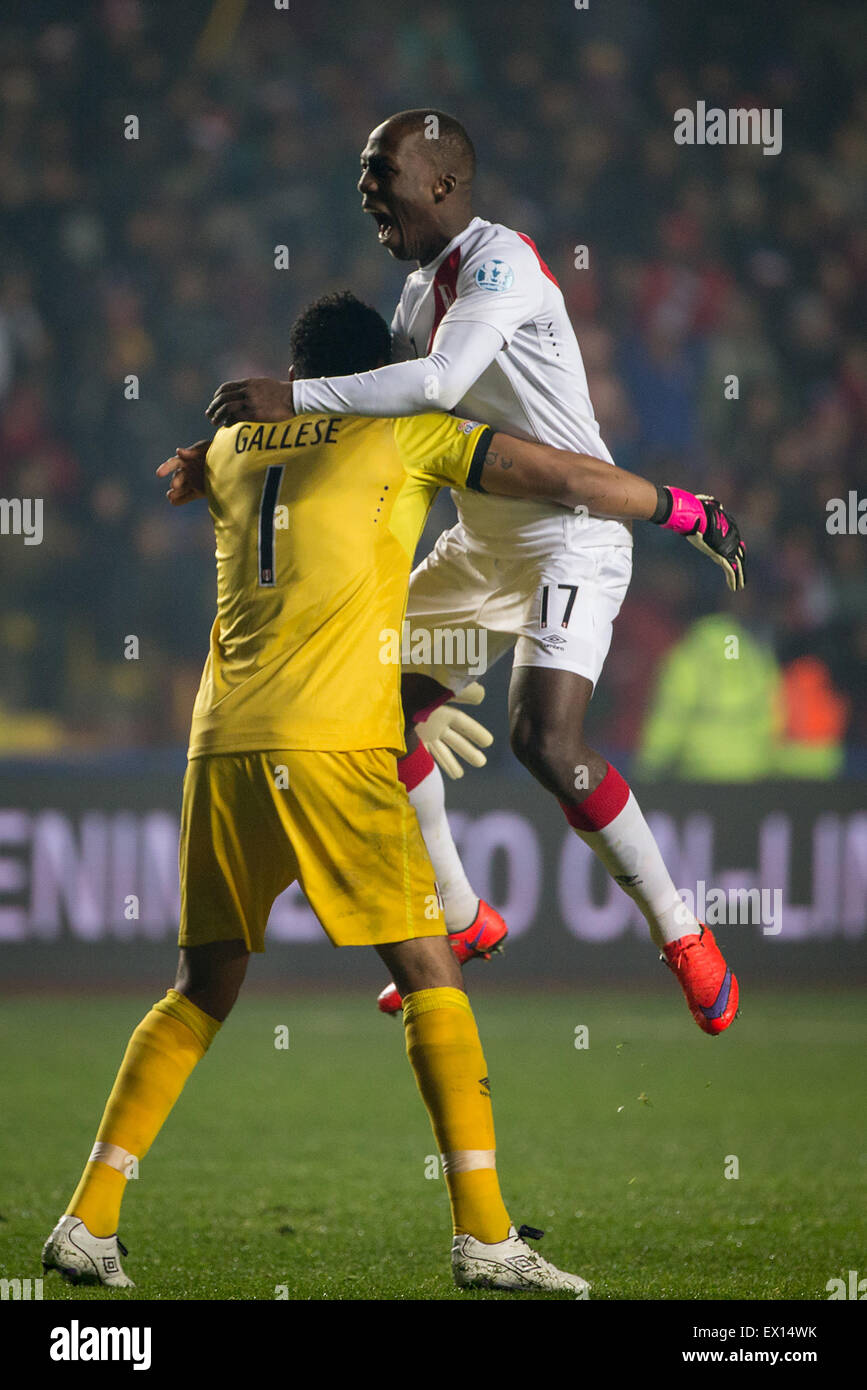 Concepcion, Chile. 3rd July, 2015. Peru's goalkeeper Pedro Gallese (L) and Luis Advincula celebrate a score during the match for the Third Place of the America Cup Chile 2015, against Paraguay, held in the Municipal Stadium 'Alcaldesa Ester Roa Rebolledo', in Concepcion, Chile, on July 3, 2015. Peru won 2-0. Credit:  Pedro Mera/Xinhua/Alamy Live News Stock Photo