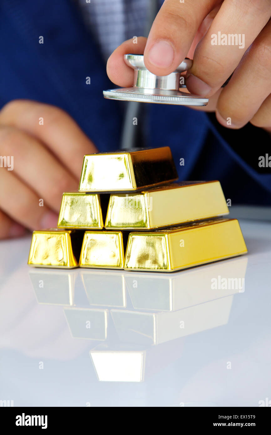 Hands with gold bars hi-res stock photography and images - Alamy
