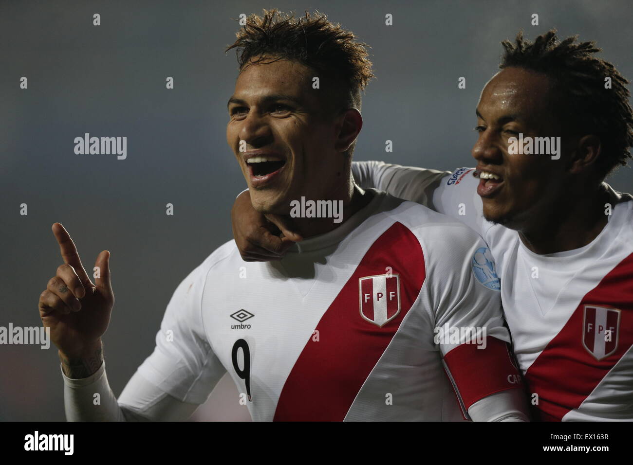 Concepcion, Chile. 3rd July, 2015. Peru's Paolo Guerrero (L) celebrates his score with his teammate Andre Carrillo (R) during the match for the Third Place of the America Cup Chile 2015, against Paraguay, held in the Municipal Stadium 'Alcaldesa Ester Roa Rebolledo', in Concepcion, Chile, on July 3, 2015. Peru won 2-0. Credit:  Jorge Villegas/Xinhua/Alamy Live News Stock Photo