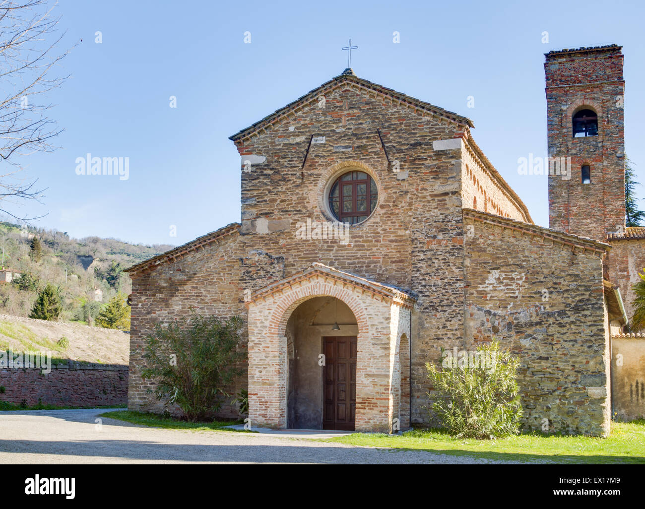 The Romanesque style church of St John at the eighth, also known as Church of Tho in Northern Italy offers a magical atmosphere full of Spirituality and trust Stock Photo