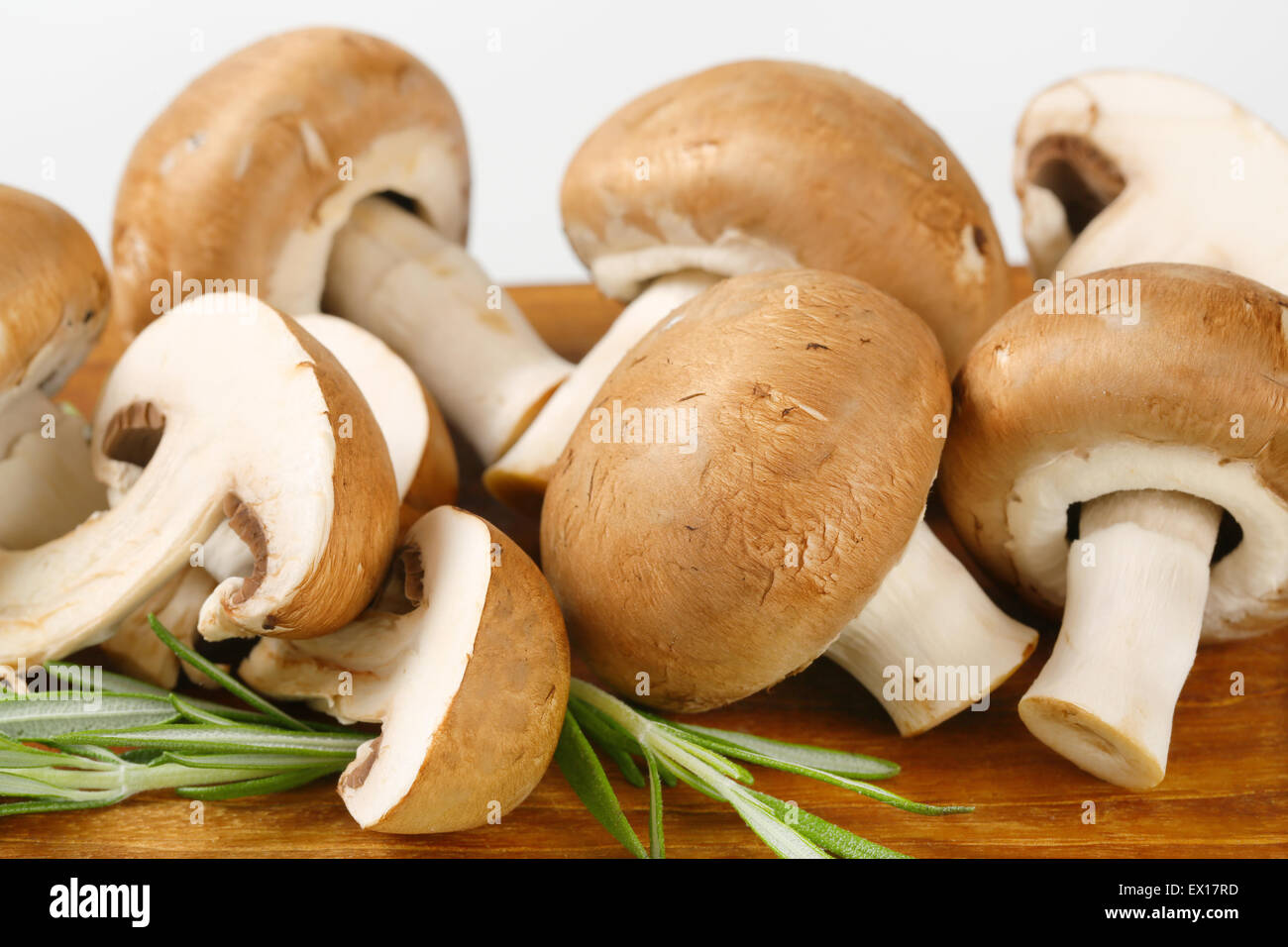 Fresh cremini mushrooms on cutting board Stock Photo Alamy