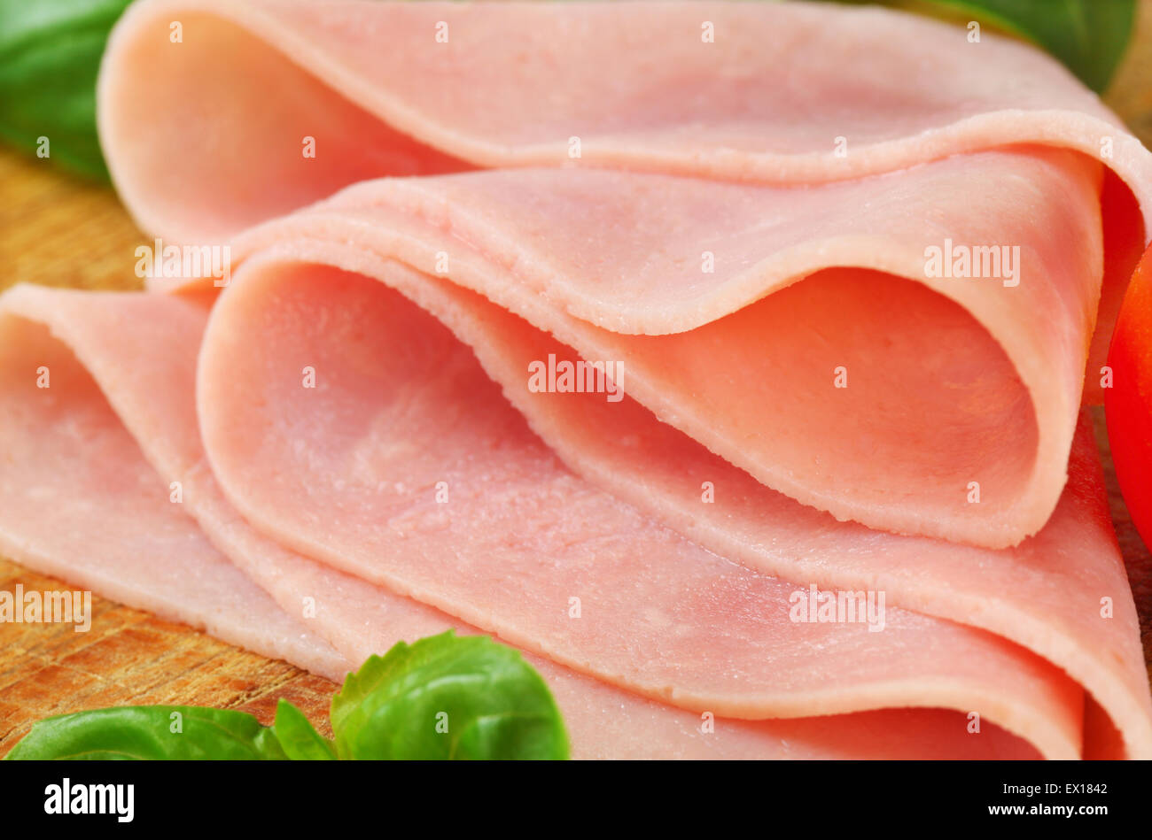Stringy Ham Cut Detail of thinly sliced ham Stock Photo - Alamy