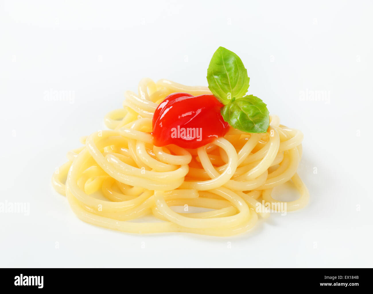 Cooked spaghetti with tomato sauce Stock Photo