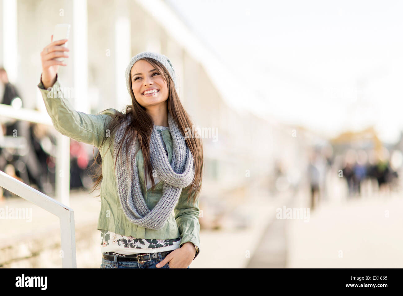 Young woman taking selfie on the street Stock Photo - Alamy
