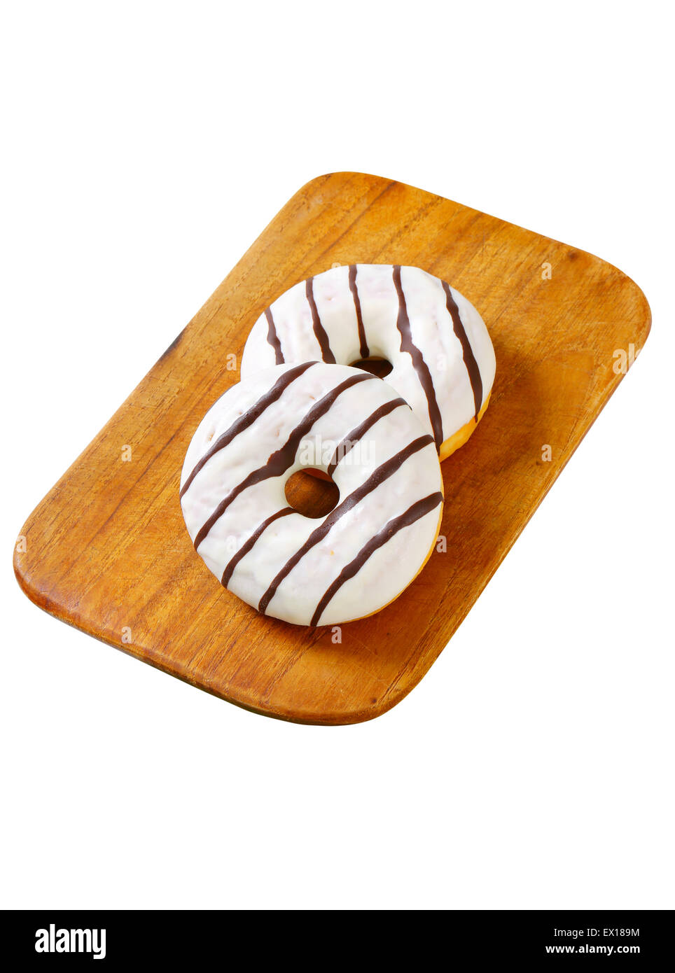 Ring donuts with vanilla and chocolate glaze Stock Photo