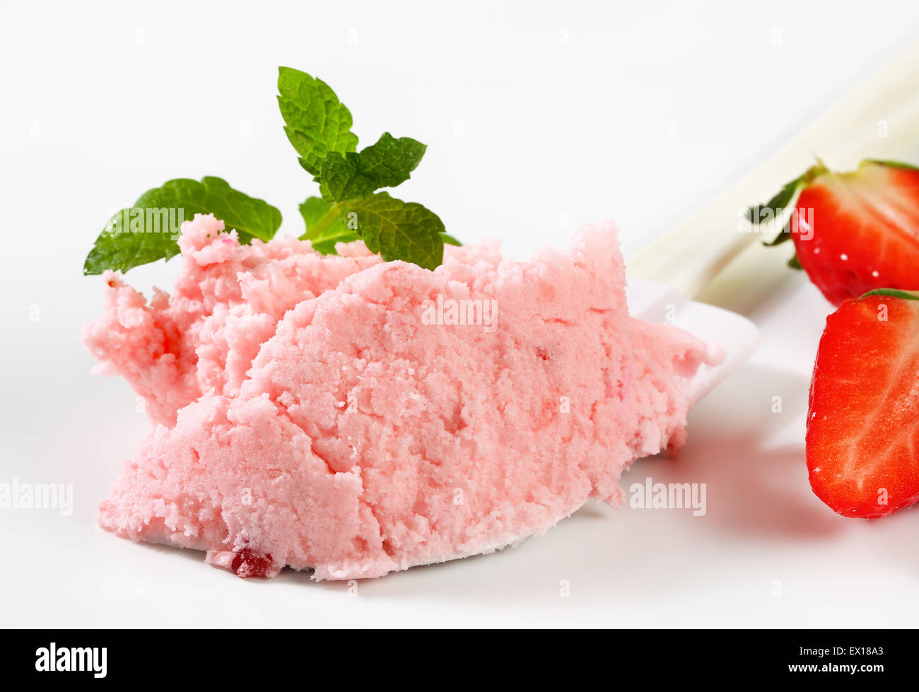 Strawberry ice cream on kitchen spatula Stock Photo