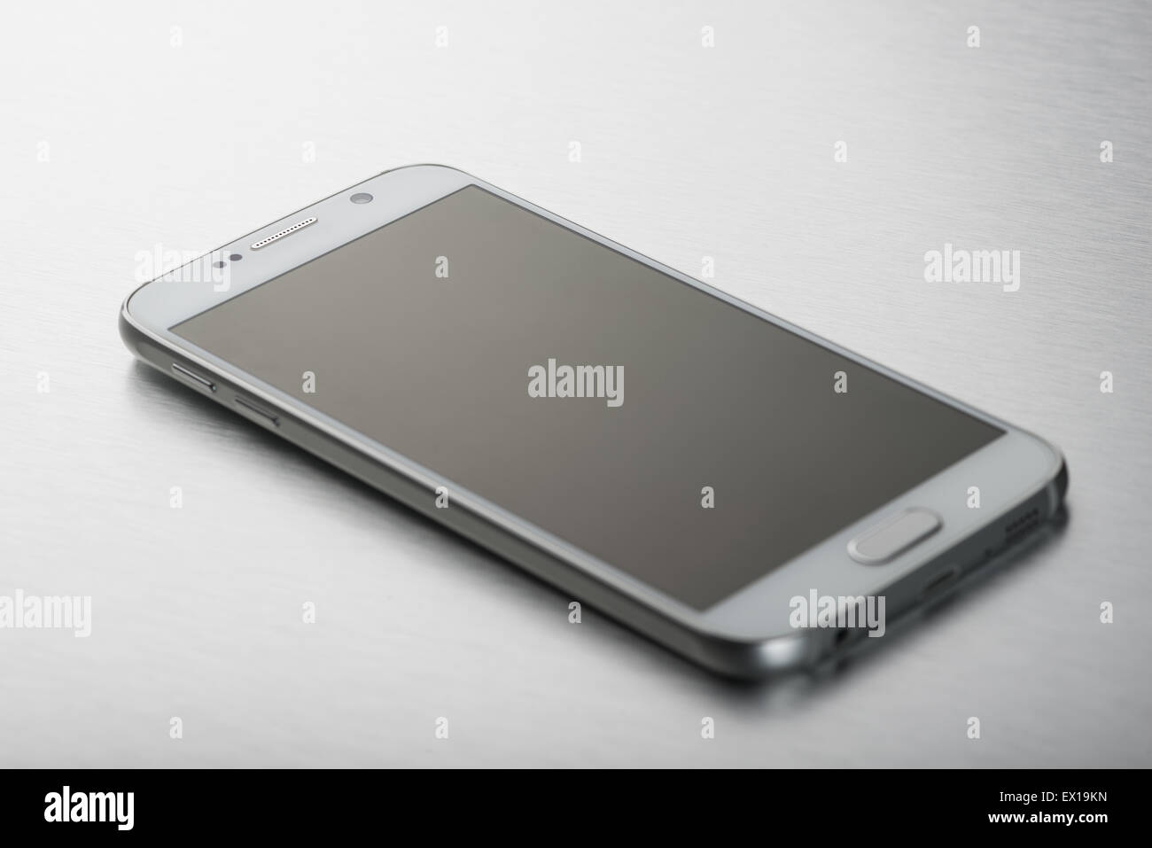 Smart phone on stainless steel background Stock Photo
