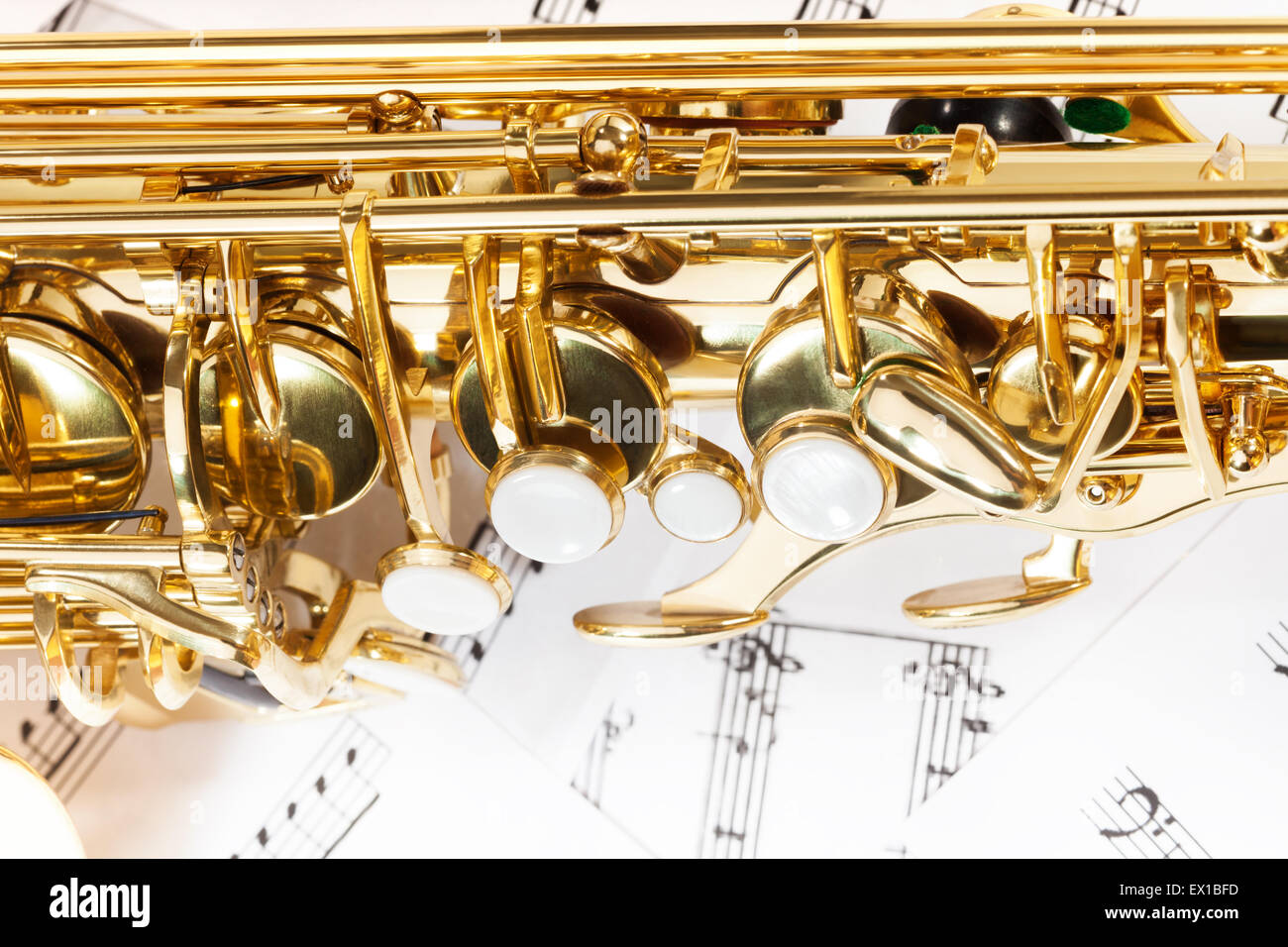 Shiny golden alto saxophone keys close-up view Stock Photo