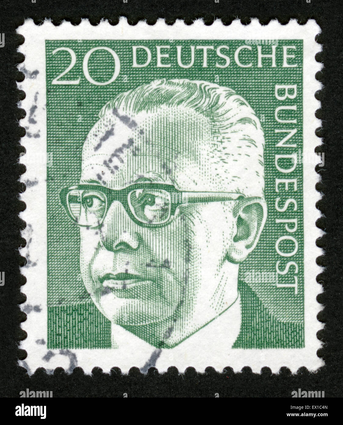 GERMANY - CIRCA 1971 A stamp printed in Germany showing a portrait of Federal President Gustav Walter Heinemann, circa 1971. Stock Photo