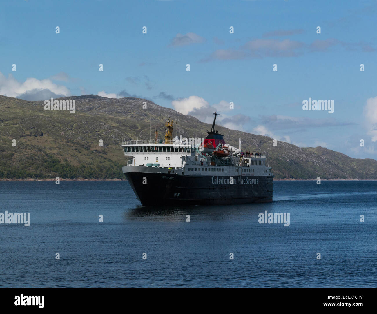 Calmac ferry from Oban crossing Sound of Mull Argyll and Bute Scotland connecting islands to mainland on a lovely June day weather blue sky Stock Photo