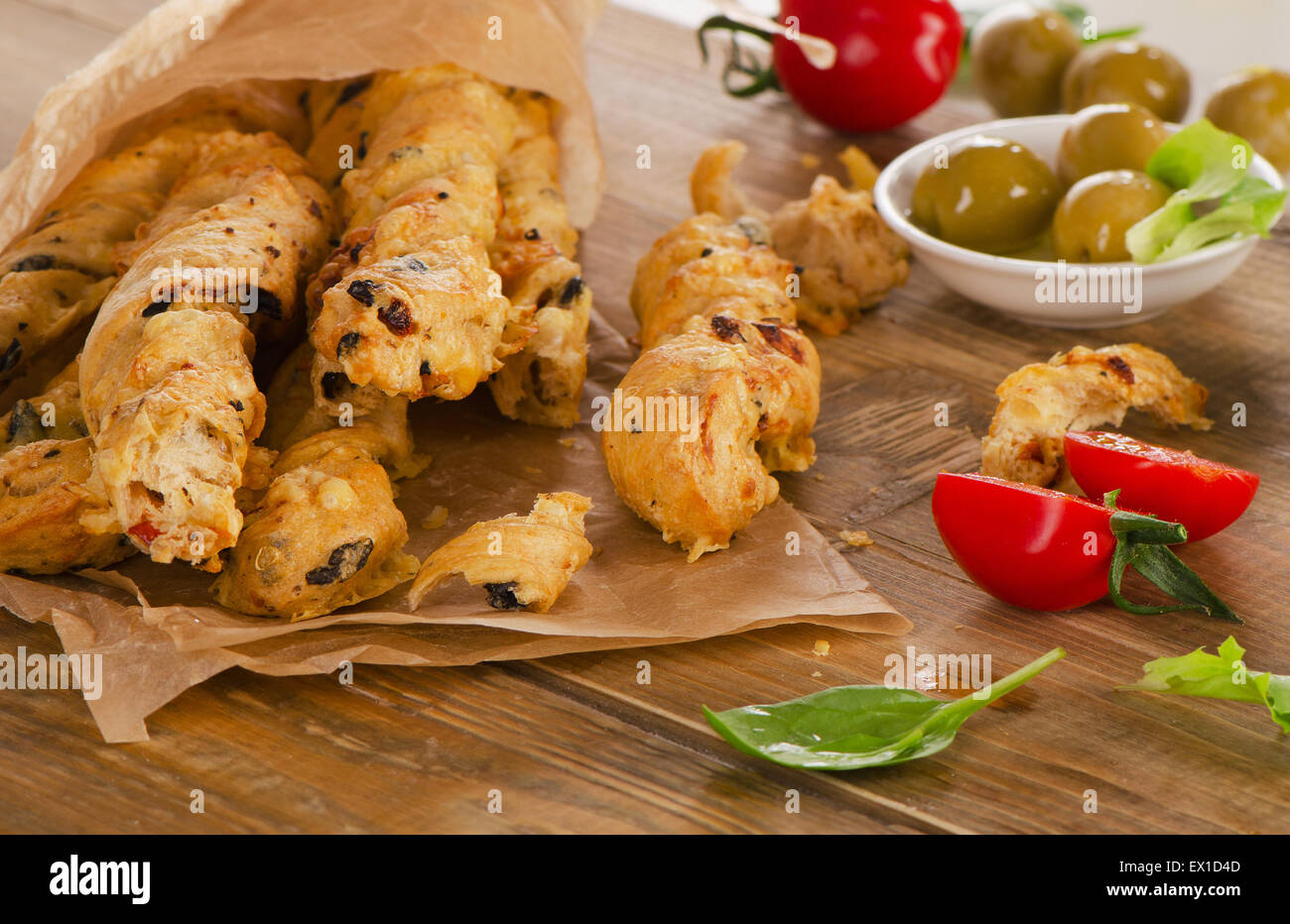 Homemade BreadSticks on  old rustic wooden board. Selective focus Stock Photo