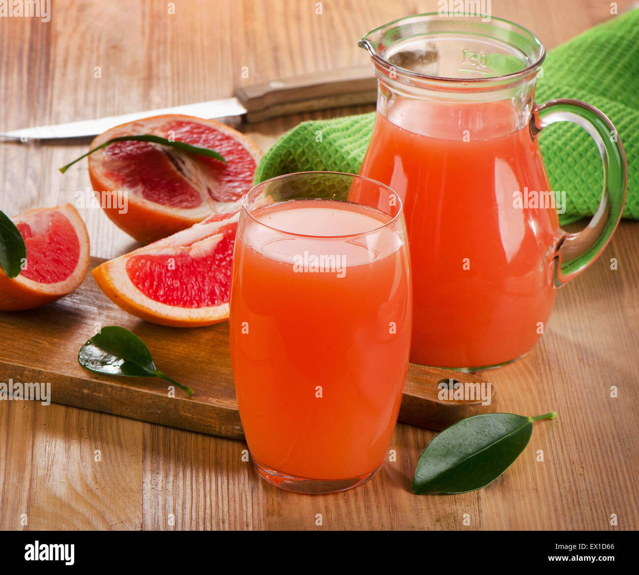 Grapefruit juice  on a rustic wooden table. Selective focus Stock Photo