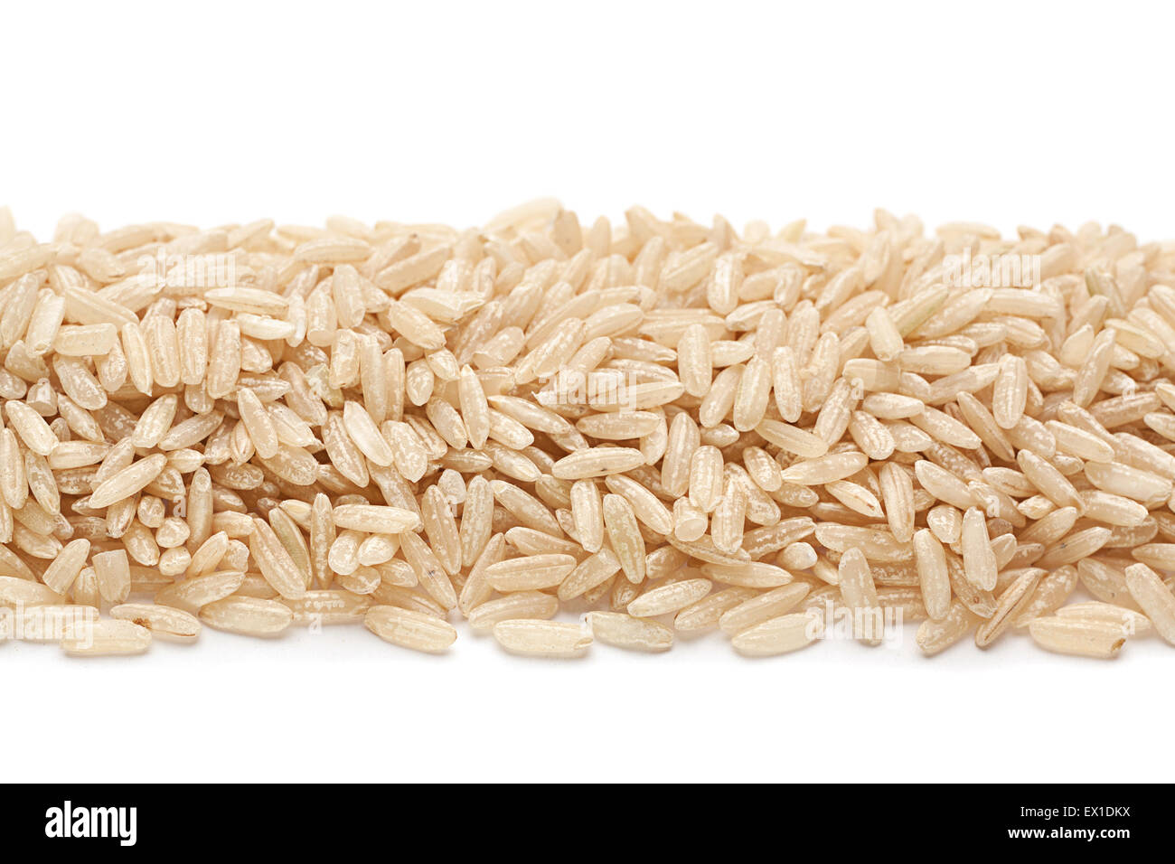 Unpolished rice seed closeup isolated on white Stock Photo
